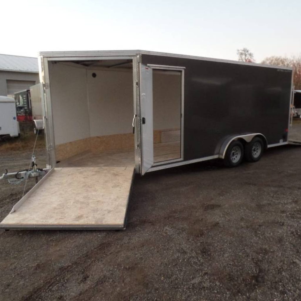 3 Place Snowmobile Trailer, in stock as of 11-7-2022 ,  3 Snowmobile or 1 Side X Side, Trailer Aluminum Frame, Galvanized Torflex Axles,18ft + 5 ft. V nose, Front and Rear Ramps. Extra Height.