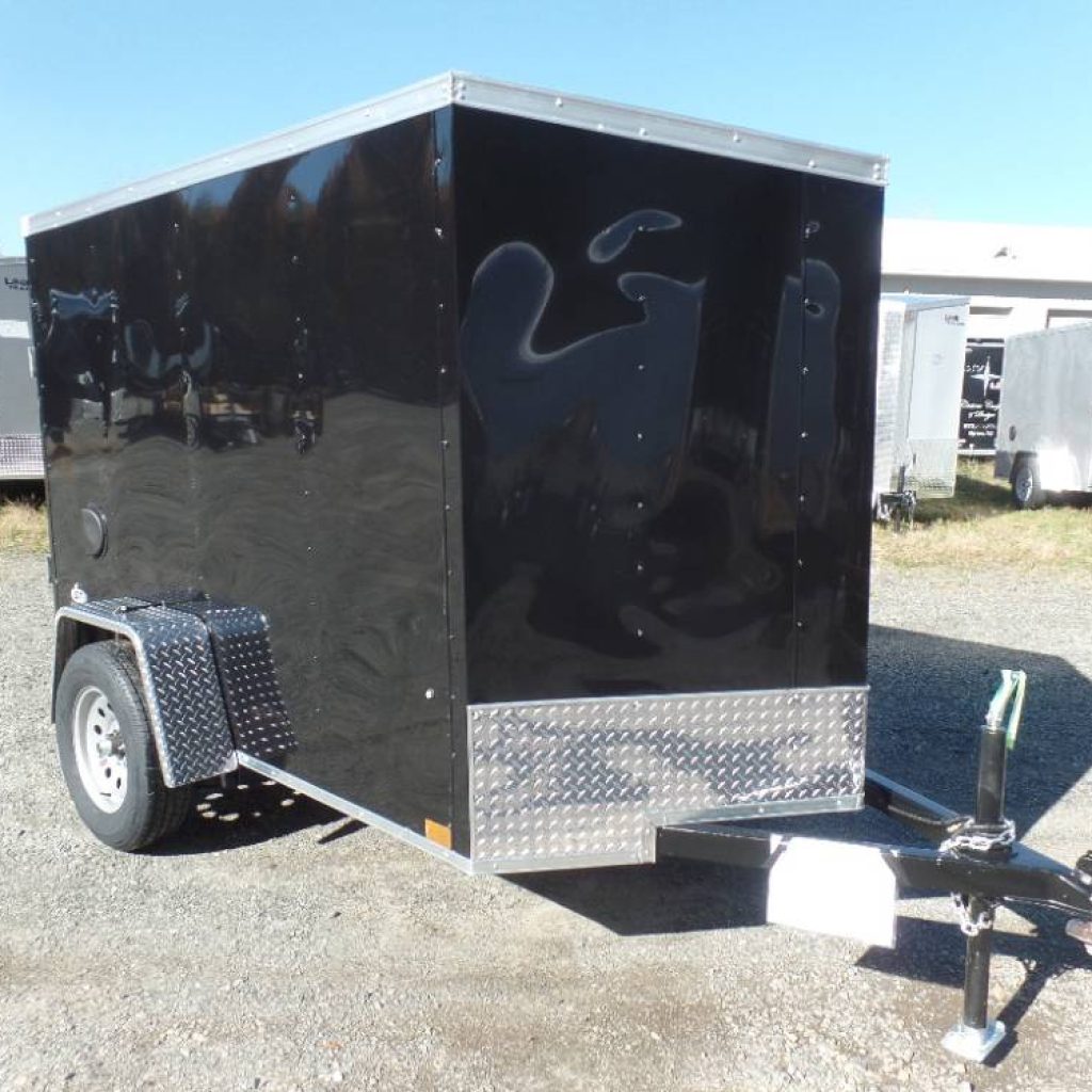 5 X 8 Enclosed Trailer with Ramp door on back.