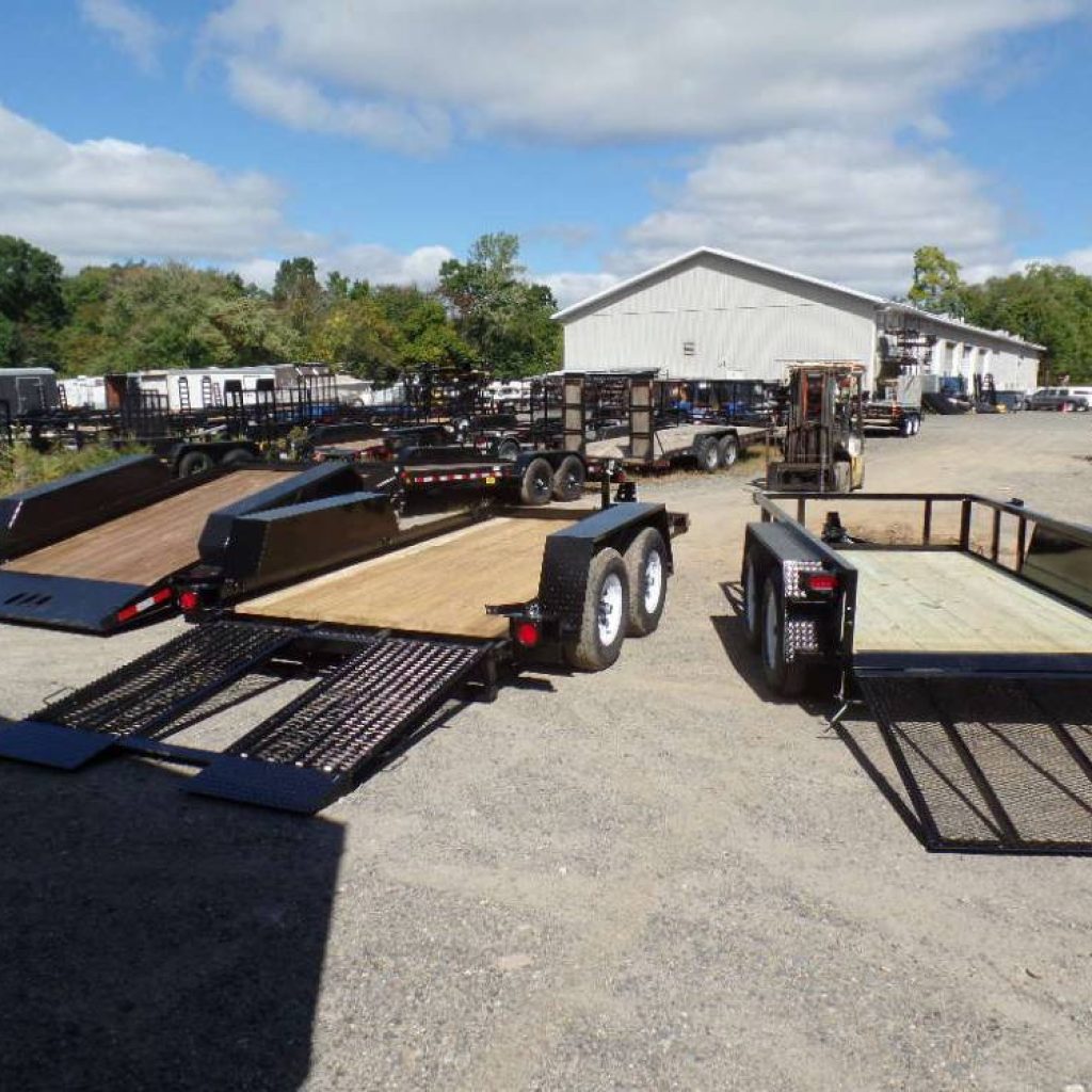 Move a Scissor Lift, Mini Skid Steer, Stump Grinder, or small Forklift.  Specialty Trailers.  Low Deck Height, Low Clearance Equipment Loading
