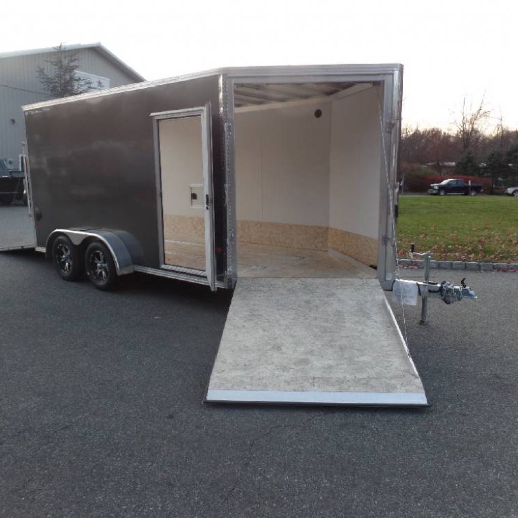 2 Place Inline Snowmobile Trailer , 
14 ft plu 5 ft. V nose, with ramp on front, and ramp on back, drive in drive out.