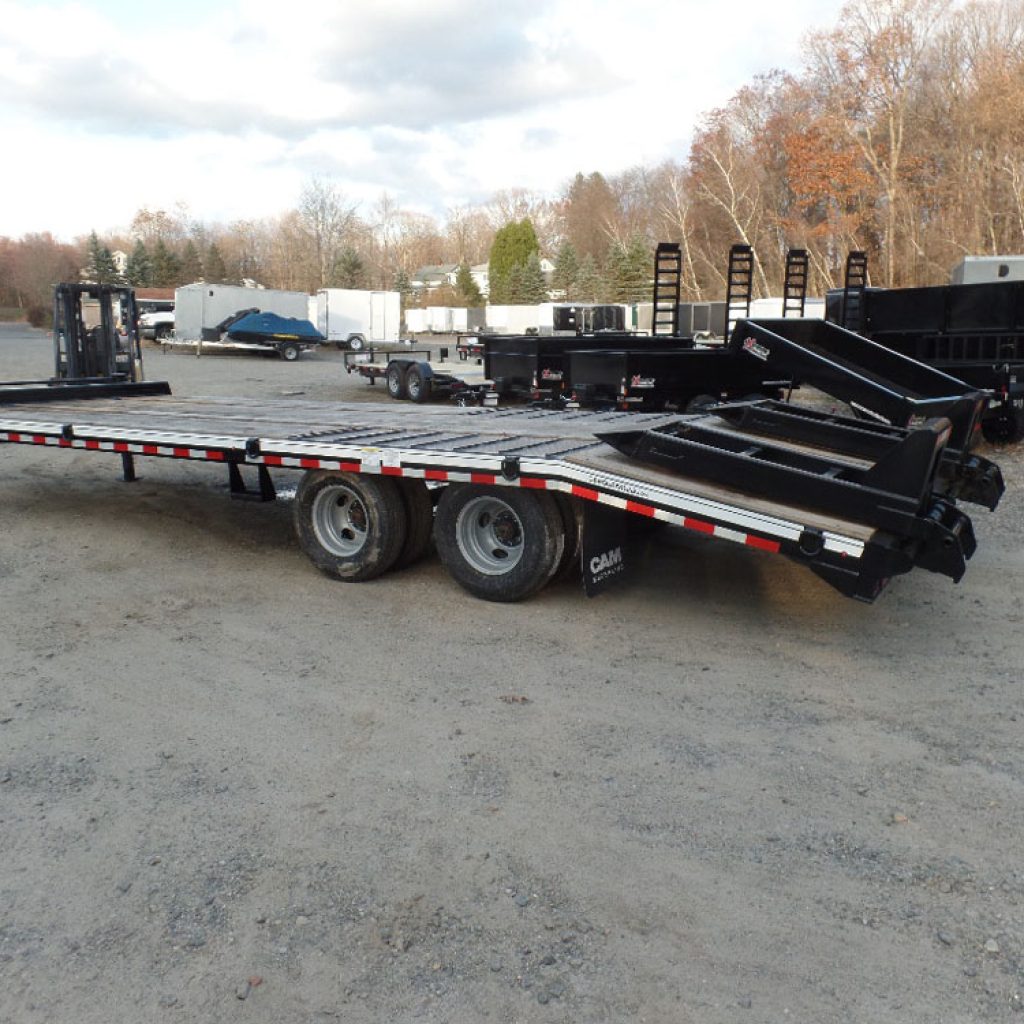 Heavy Duty 10 Ton Deck Over Equipment Trailer CAM Superline Brand, Ten Ton Payload Deck Over Equipment Trailer, 8 1/2 ft. wide deck, wood filled ramps with spring assist, two dually axles, electric brakes