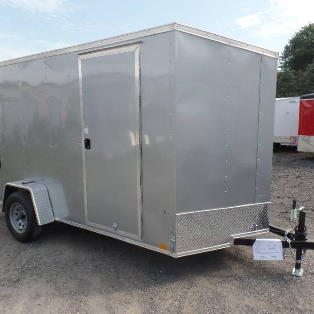 6x12 ENCLOSED TRAILER, 6.5 ft interior height, single axle, 2,990 lb. GVWR, ramp door, side door, one piece aluminum roof.