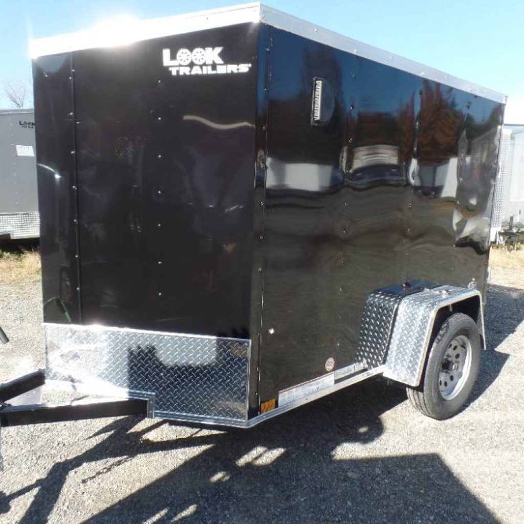 Small enclosed cargo trailer, 5X8 with a ramp on back, 5 ft 6