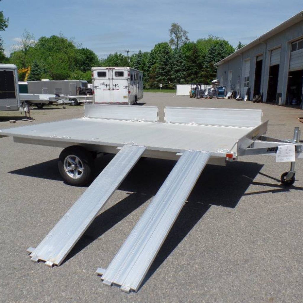 3 Place Quad Trailer, lightweight , only 650 lbs. empty, all aluminum frame, and deck, aluminum rims, torflex axle, radial tires, LED lights. one new one PRE-OWNED