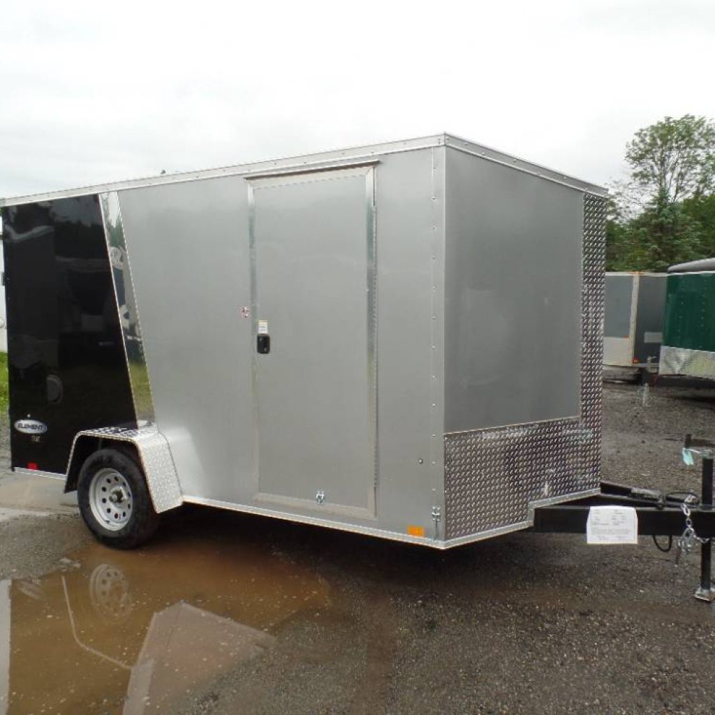 Enclosed Trailer good for 2 large motorcycles, 7X12 with ramp door and side door, 3,500 lb. GVWR with electric brakes.