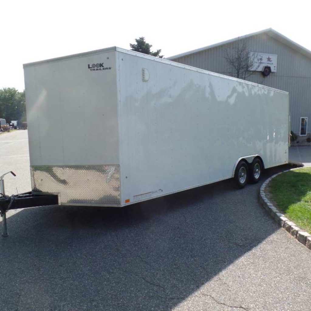 Enclosed Car Trailer 8.5X24 X7 ft. interior height. 9,990 lb. GVWR, V nose, 86 ft. of E Track installed on Walls, and Floor.  Rental Unit.