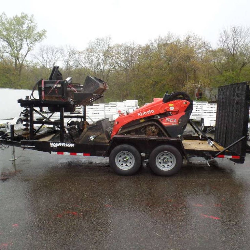 Mini Excavator trailer with Implement Storage Rack, 9,990 lb. GVWR, Payload rated 7,848 lbs., Heavy Duty Splt Ramp withj Spring assist