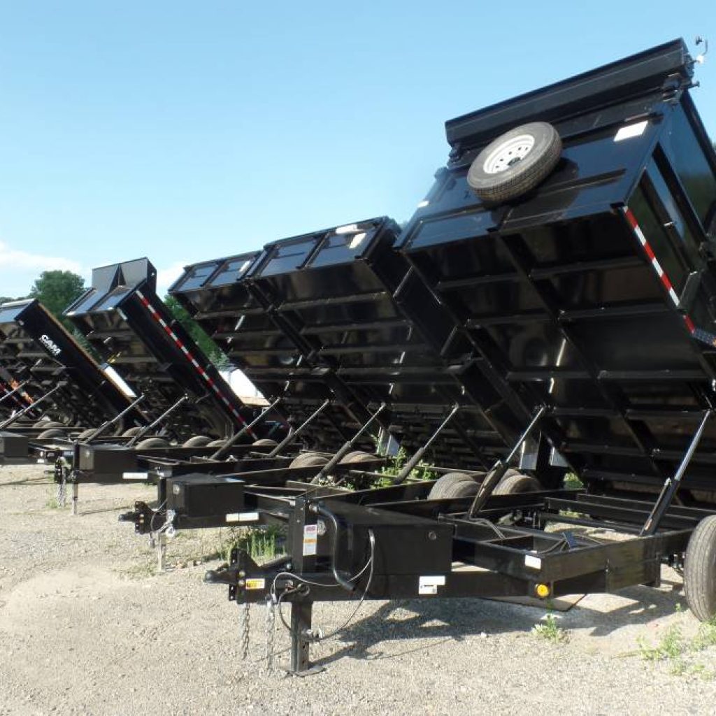 Dump Trailers on Sale, many in stock, SALE Prices, call, text, email, or come in for full details.  6X10, 6X12,7X12,7X14 ,7X16 Heavy Duty Dump Trailers, many with extra framing, power up power down hydraulics, tarp and roller, spare tire, 7,000 GVWR up to 14,000 lb. GVWR