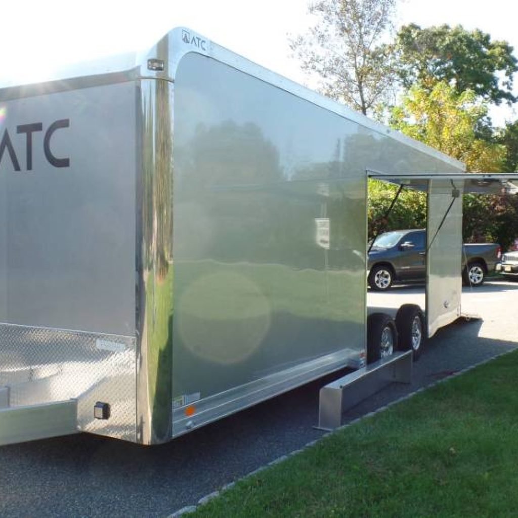 ATC Brand 8.5X24 enclosed car trailer, Coin Floor Plus Package, Airline Track in floor, Finished Interior, Cabinets, Premium Escape Door.