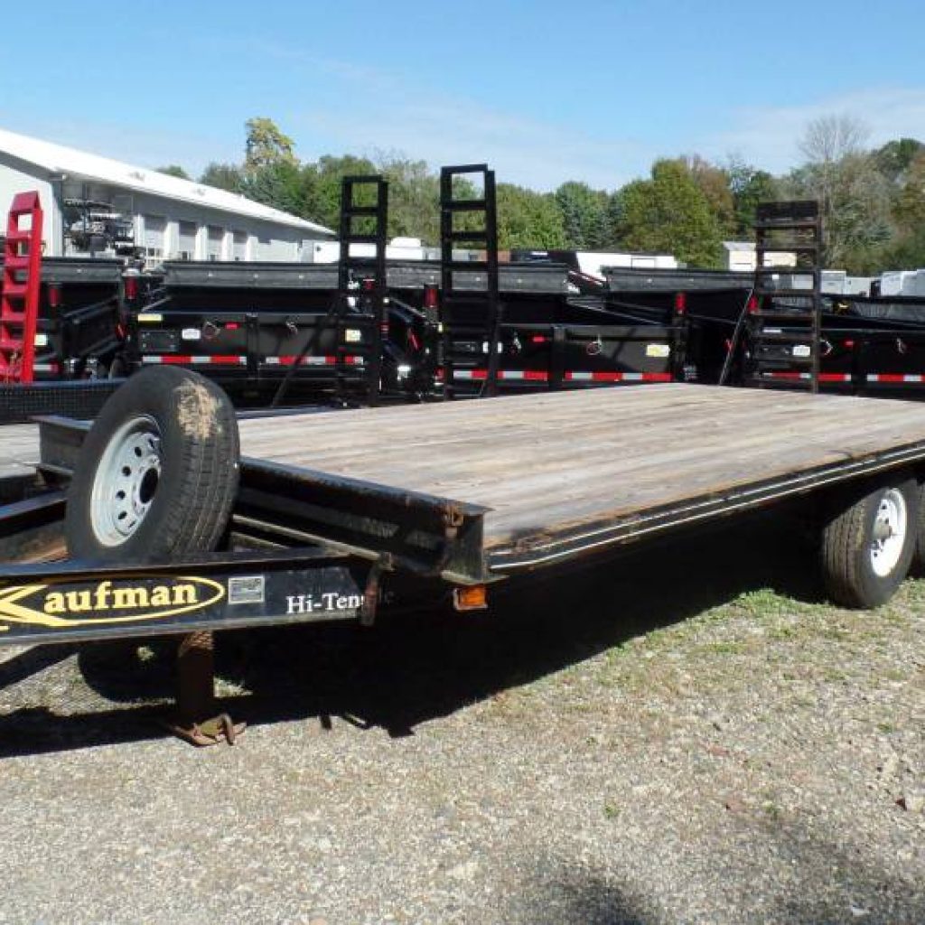 USED Equipment Trailer , 8.5 ft. wide X 20 ft. long deck.  16 ft. flat deck with 4 ft beavertail, 5 ft ladder ramps, 14,000 lb. GVWR