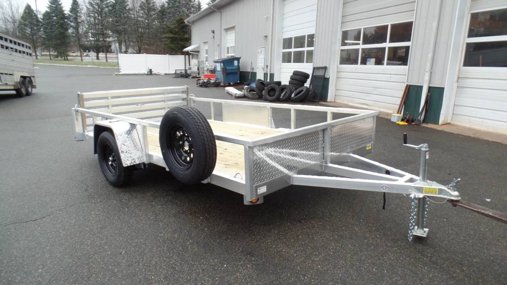 Utility Trailer, Aluminum Frame, Wood Deck, Ramp, Bi-Fold, LED Lights, 2,990 lb. GVWR, Stoneguard, 890 lbs. empty weight.