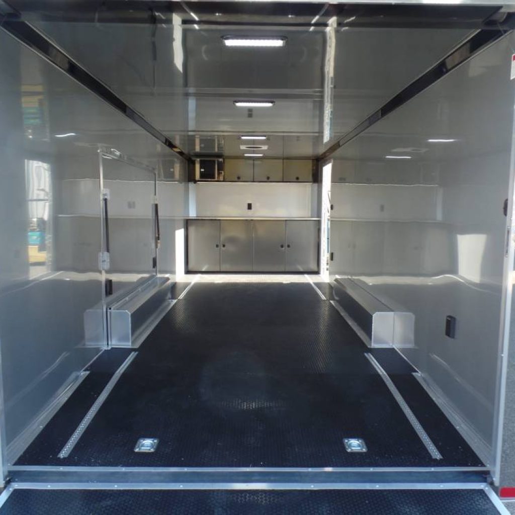 Car Trailer Enclosed, ATC Brand, Premium Escape Door with Removable Fender, Finished Interior, Insulated, Coin Plus Package Model