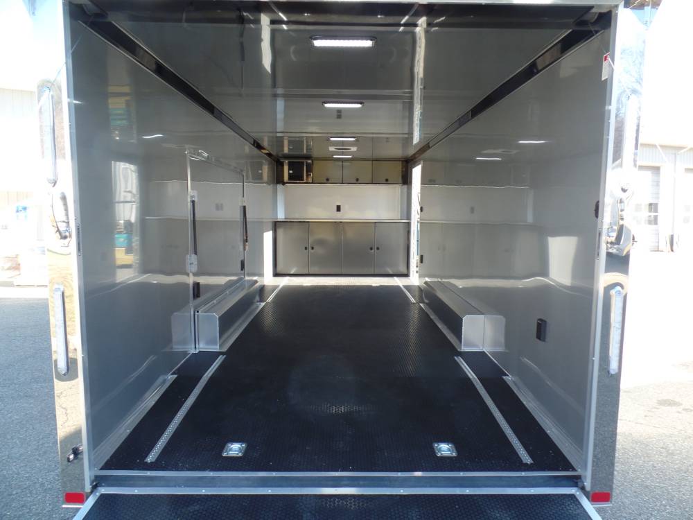 Car Trailer Enclosed, ATC Brand, Premium Escape Door with Removable Fender, Finished Interior, Insulated, Coin Plus Package Model