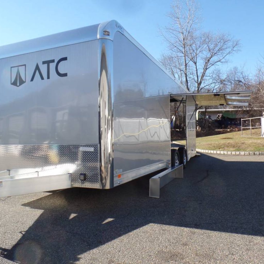ATC Brand 8.5X24 enclosed car trailer, Coin Floor Plus Package, Airline Track in floor, Finished Interior, Cabinets, Premium Escape Door with removable fender, 9,990 lb. GVWR, 50 amp electric, black coin rubber floor, end of season sale.