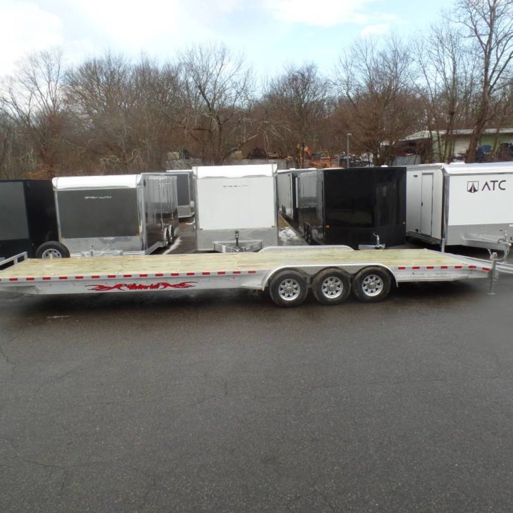 Two Car Trailer, Aluminum Frame, Wood Deck, 21,000 lb. GVWR, 7 ft long aluminum loading ramps, 3 - 7,000 lb. galvanized axles, 16 D rings