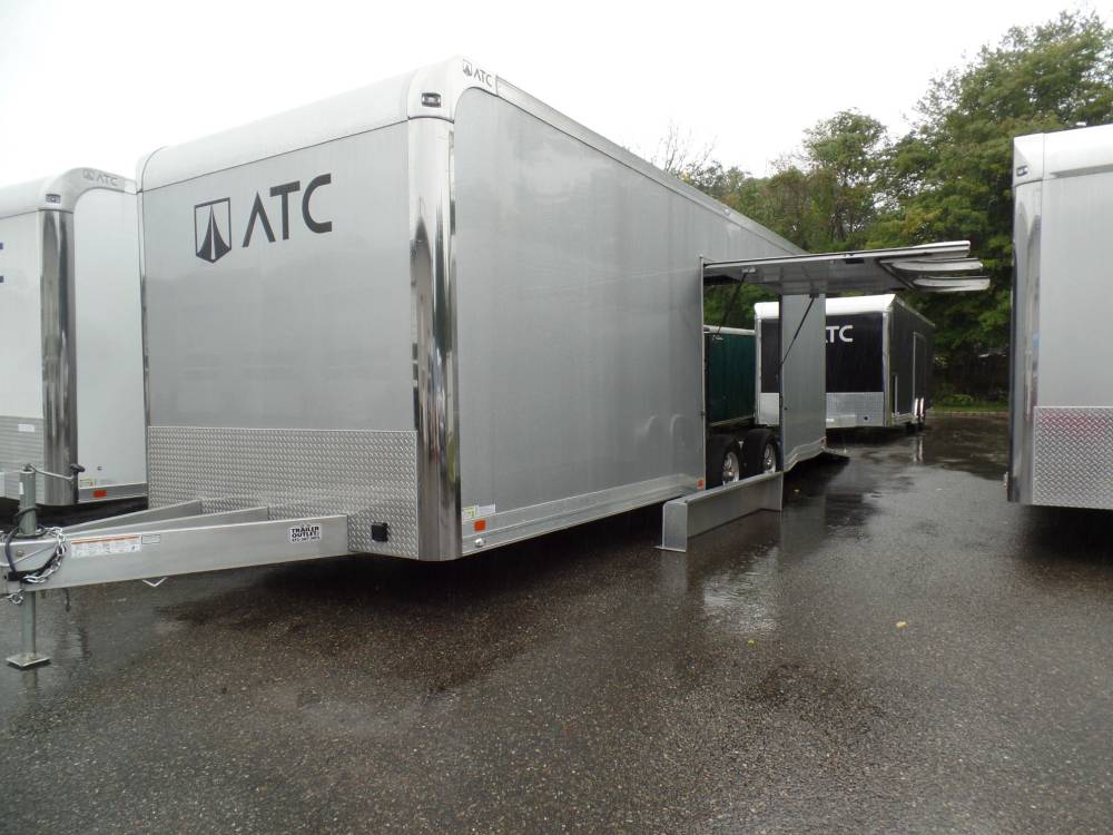 Like New ATC Enclosed Car Trailer, 2022 Model Year, Finished Interior, Escape Door with Removable Fender, Cabinets, 9,990 GVWR